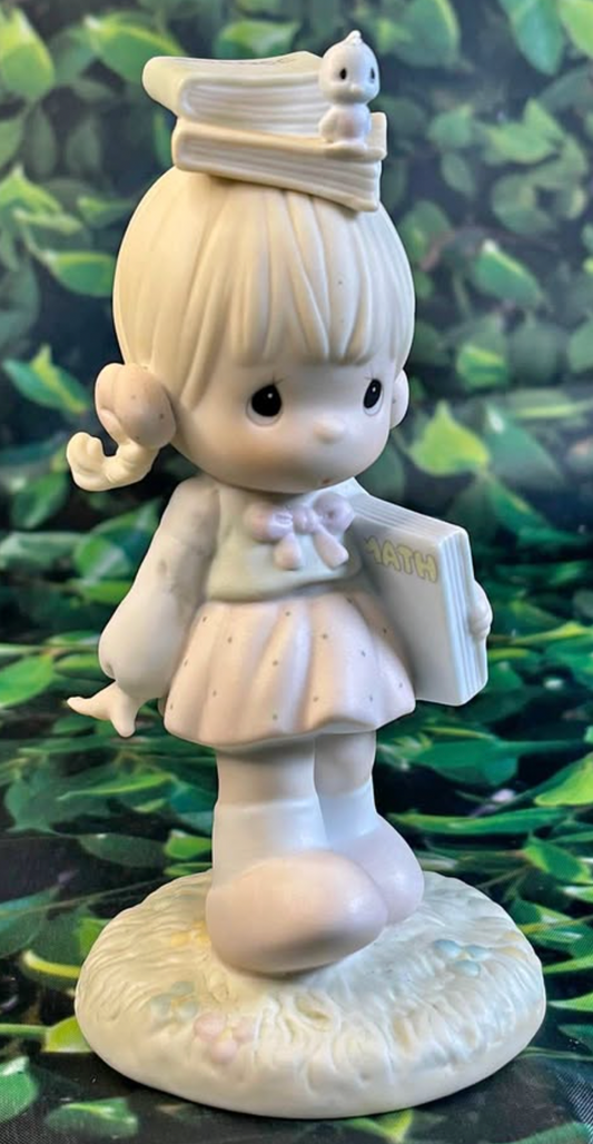 Precious Moments Figurine – September Girl with Books (1988 Birthday Series)