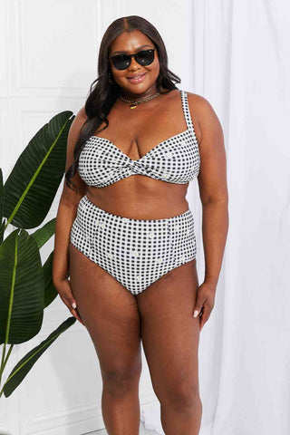 In a variety of colors and prints, this high-waisted bikini is sure to meet everyone's taste. The twist-front top is flirty and the high-rise bottoms are flattering.Marina West Swim Take A Dip Twist High-Rise Bikini in BlackPGST