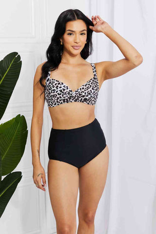 In a variety of colors and prints, this high-waisted bikini is sure to meet everyone's taste. The twist-front top is flirty and the high-rise bottoms are flattering.Marina West Swim Take A Dip Twist High-Rise Bikini in LeopardPGST