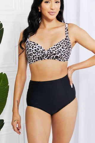 In a variety of colors and prints, this high-waisted bikini is sure to meet everyone's taste. The twist-front top is flirty and the high-rise bottoms are flattering.Marina West Swim Take A Dip Twist High-Rise Bikini in LeopardPGST